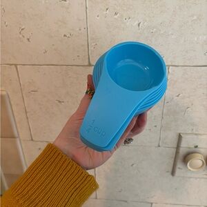 set of Tupperware measuring cups in Aruba teal blue plastic